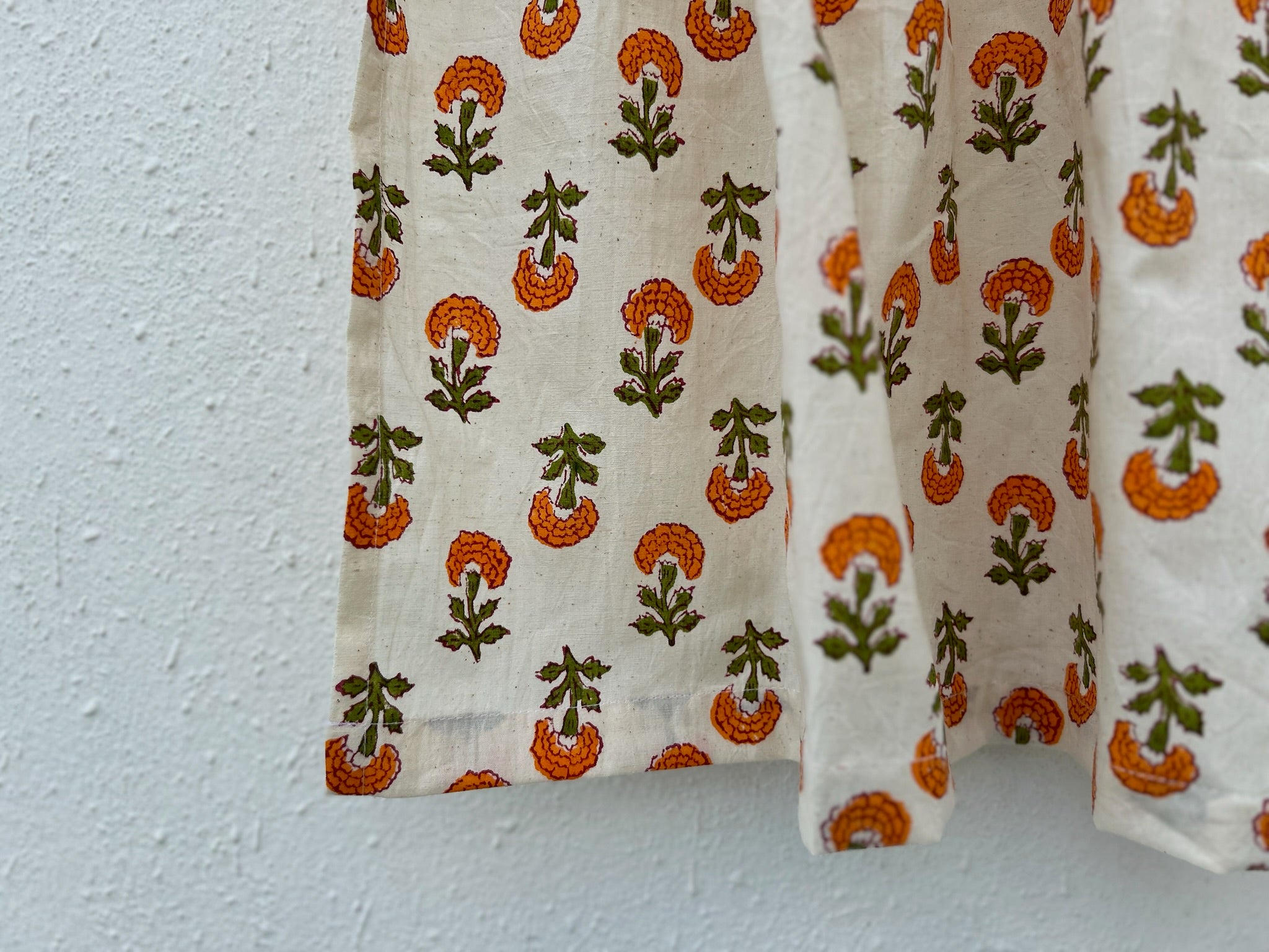 Fabric with floral pattern on a plain background