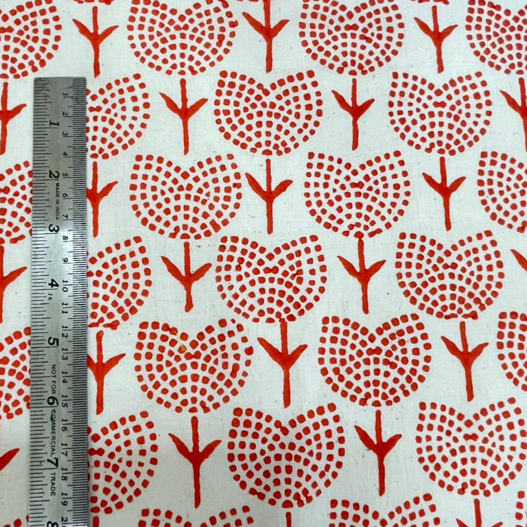 orange tulips floral pattern on a white background with a ruler for scale.