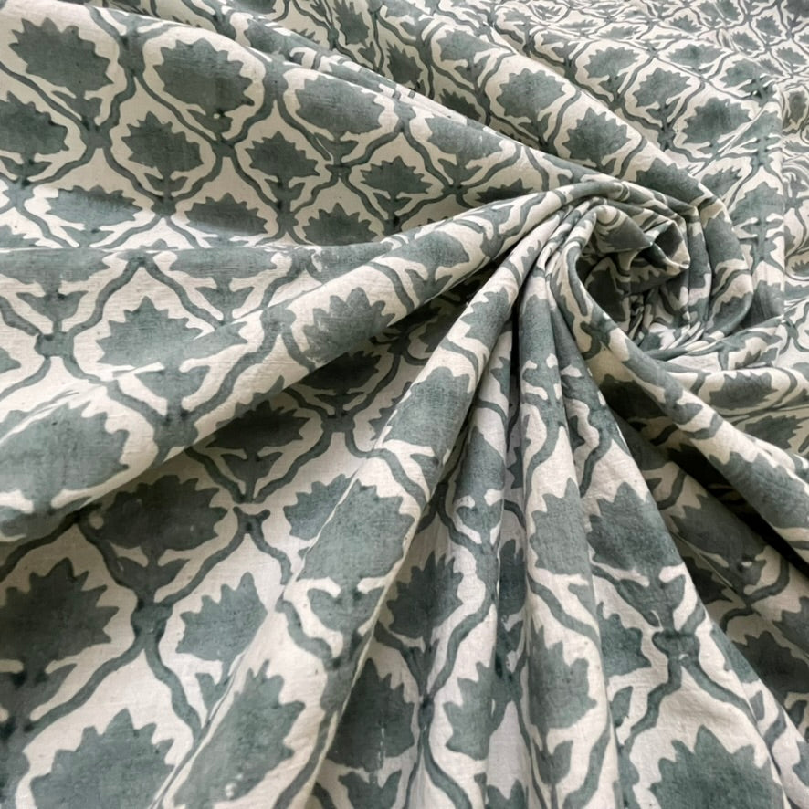 Patterned fabric with geometric design in gray and white