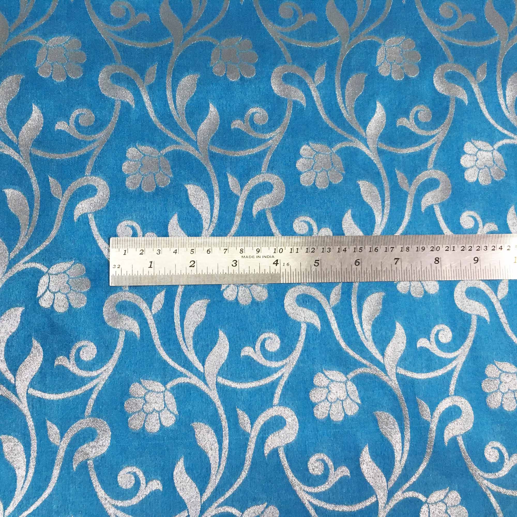 Machine woven polyester jacquard in Teal and Silver