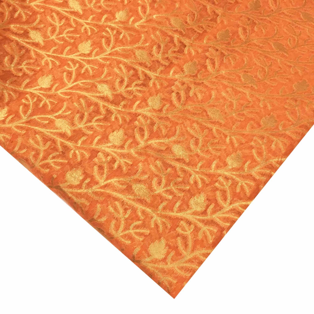 Coral and gold banarasi silk fabric