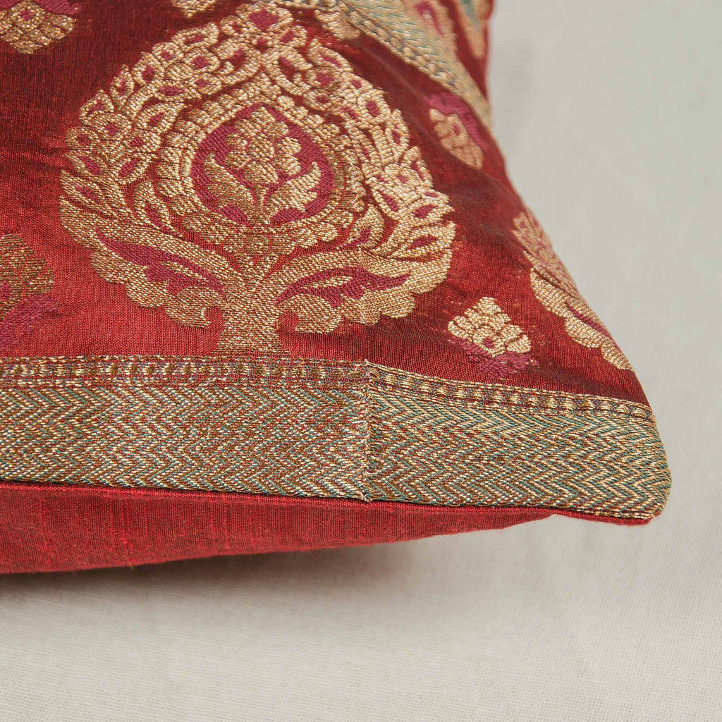 red and gold silk pillow