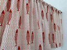 Fabric with red fish pattern on a white background