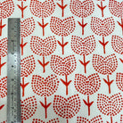 orange tulips  floral pattern on a white background with a ruler for scale.