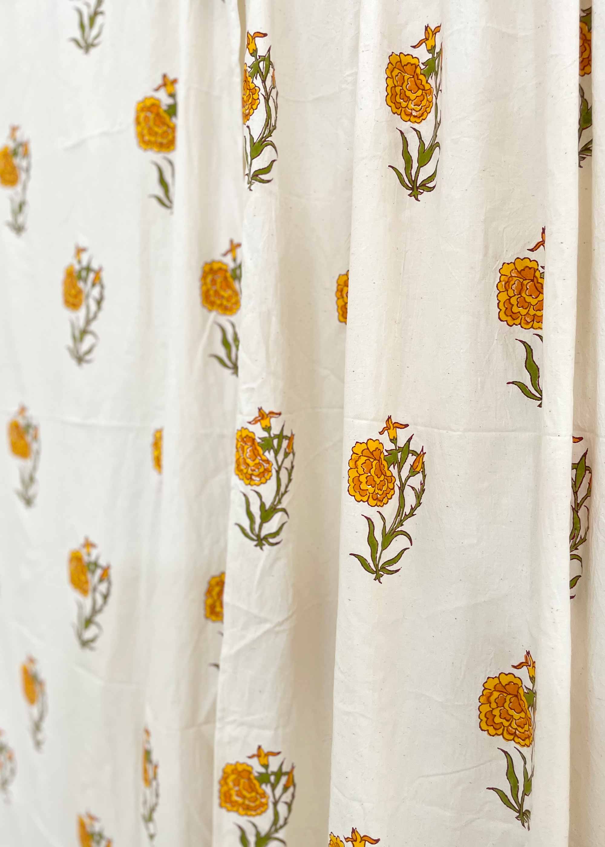 White fabric with yellow floral patterns