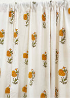 White fabric with orange floral patterns