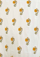White fabric with yellow floral patterns