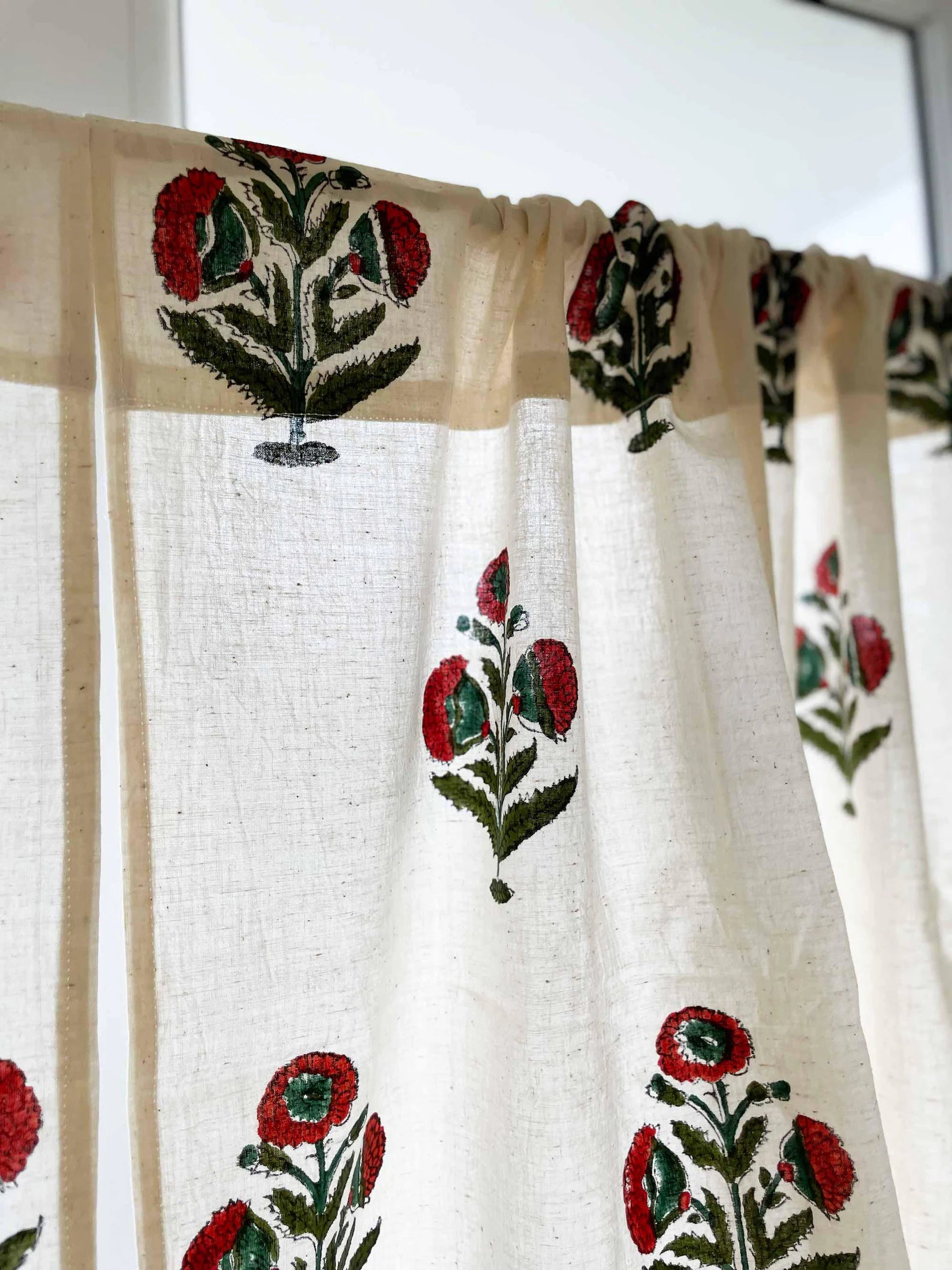 Cafe curtain with Mughal-inspired rust and green poppy motif, perfect for cupboards or windows.
