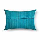 Grey and teal silk pillow cover with bold colorblocking and an elegant artisanal finish.