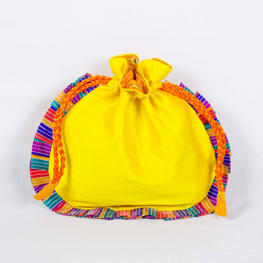Yellow drawstring potli bag by DesiCrafts
