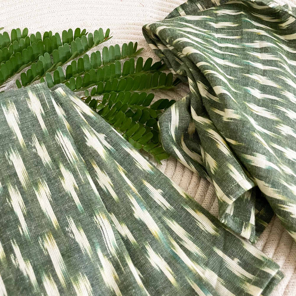 Set Of Four Green Ikat Cotton Dinner Napkins