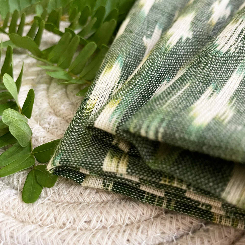 Set Of Four Green Ikat Cotton Dinner Napkins