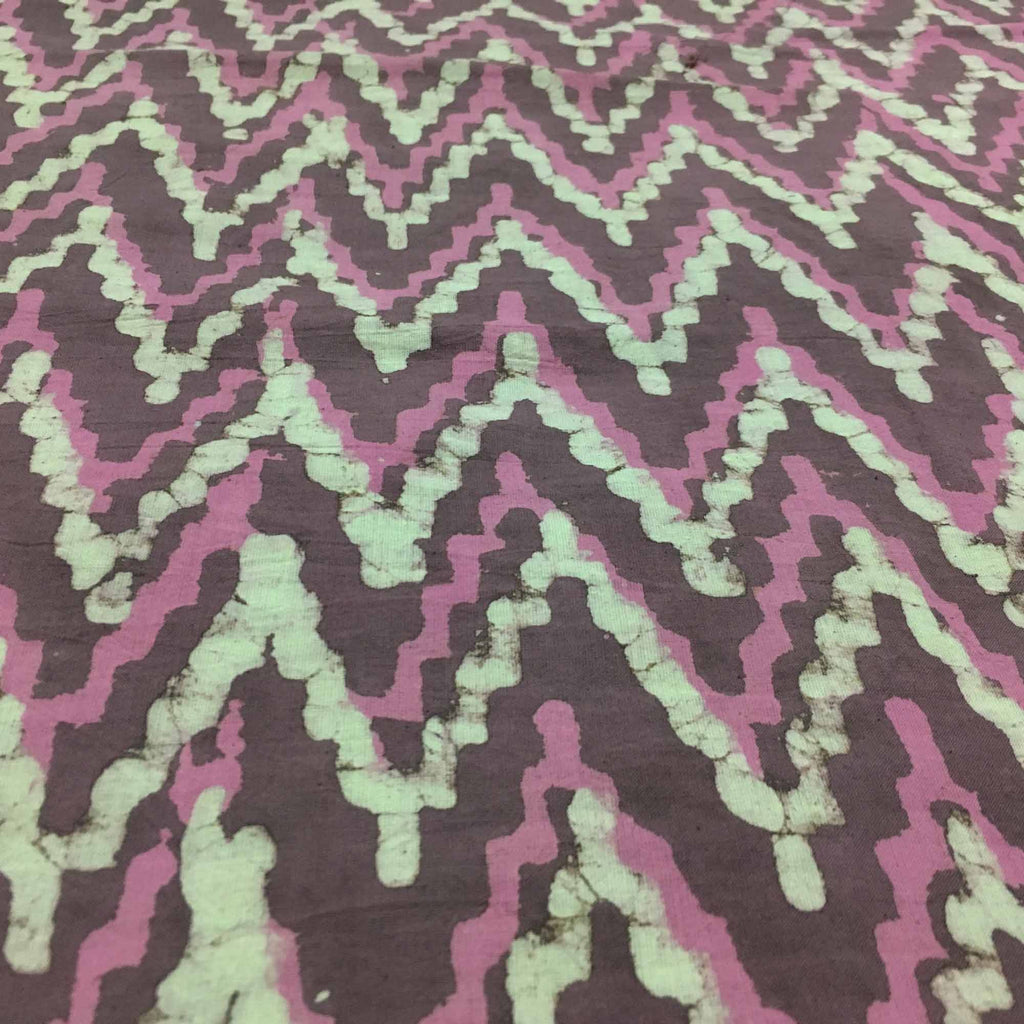 Hand block printed fabric in pink and grey
