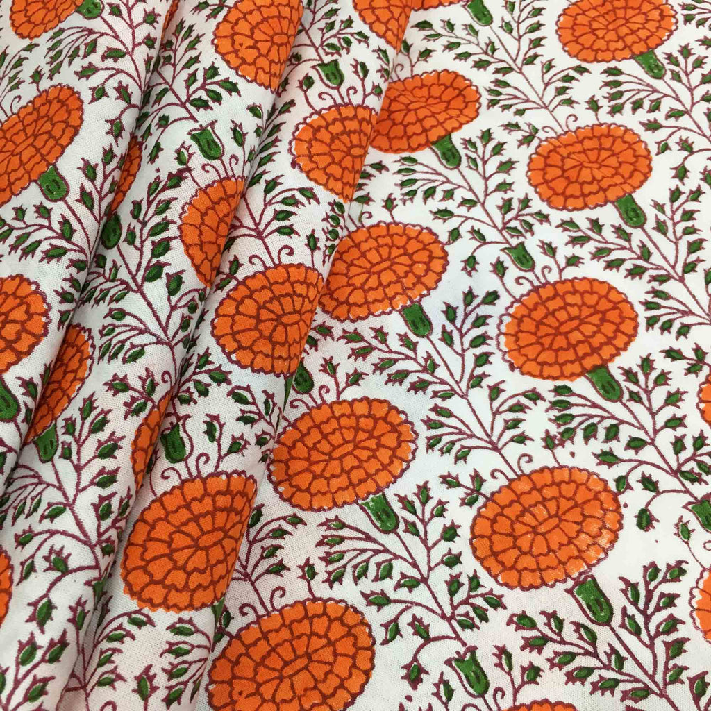 Orange marigold block print cotton fabric